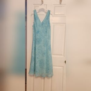 Dress size 12/14 and under shirt size large